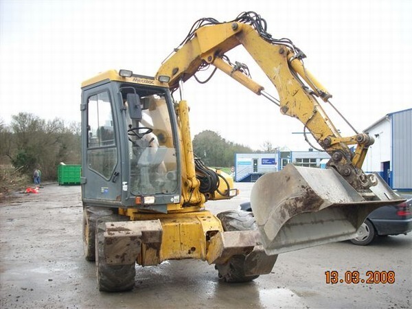 Mini-pelle hydraulique <5T > Mini-pelle hydraulique sur pneus > Mecalac > 12 MXT
